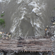 Makeshift wooden plank bridges for motorbikes to cross parts of the braided Dipu Nallah river in the dry season.